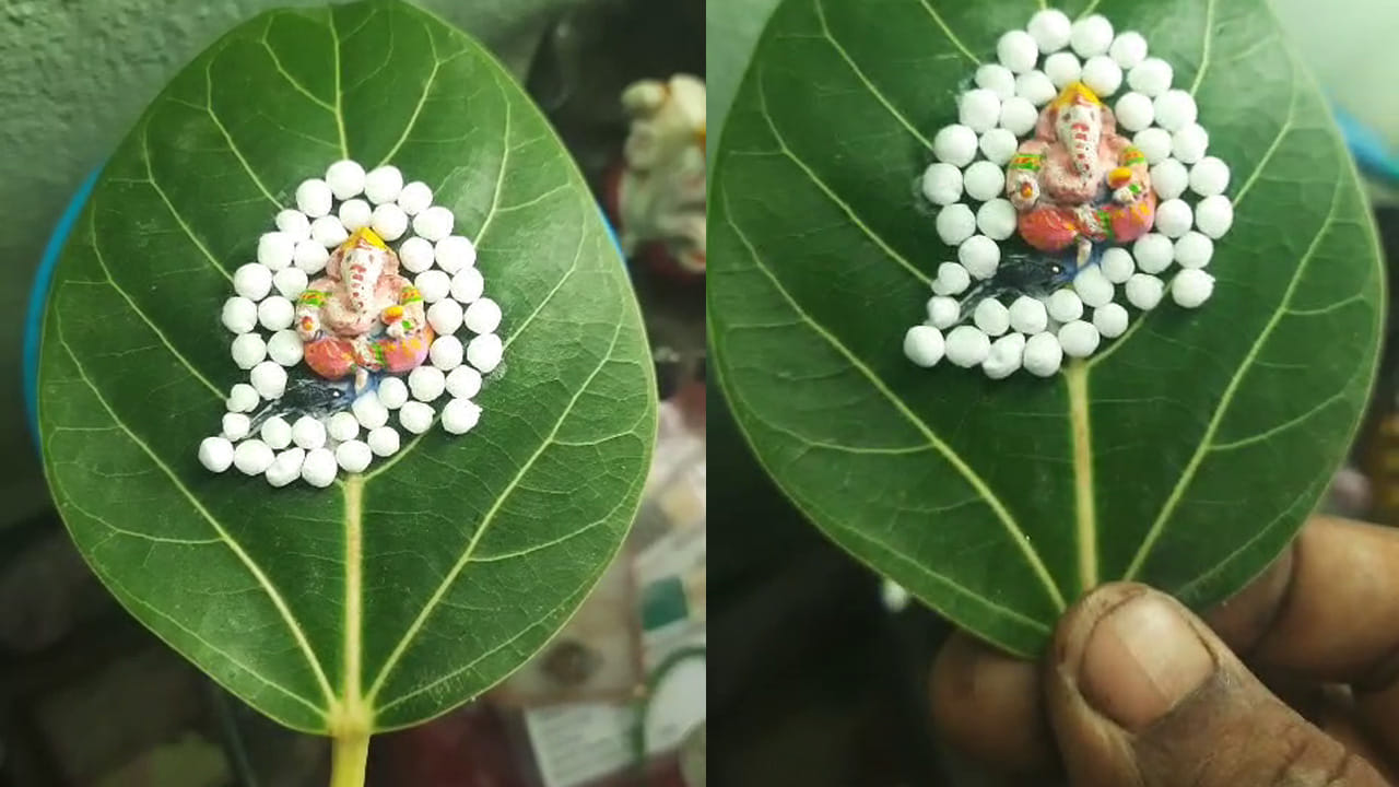 మర్రి ఆకుపై 2 సెం.మీ గణపతిని చెక్కిన వరంగల్ కళాకారుడు